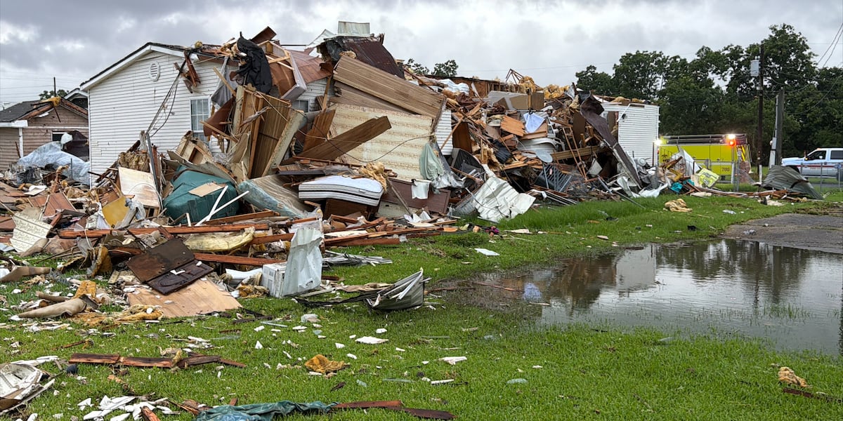 Woman pinned to sofa as tornado tears through town