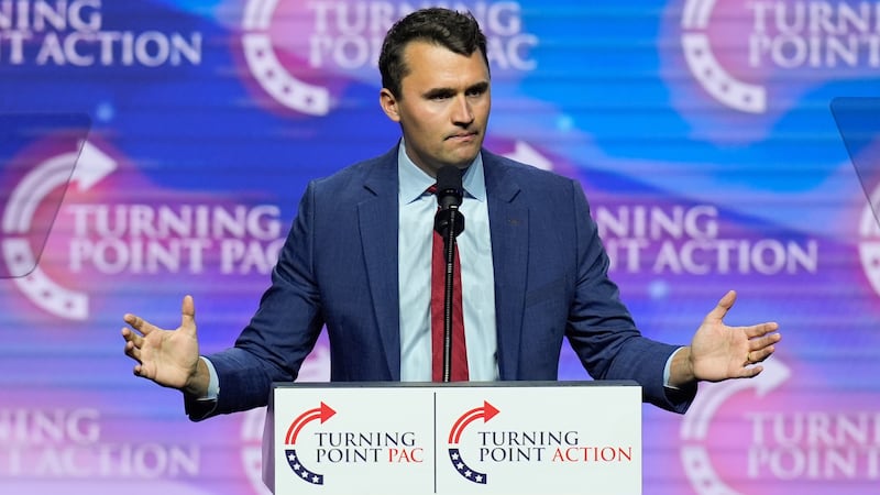 FILE - Turning Point USA Founder Charlie Kirk speaks during a campaign rally, Oct. 24, 2024,...