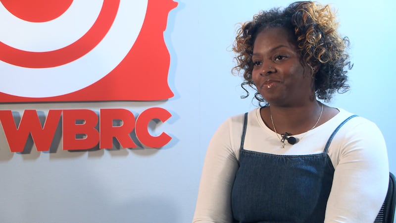 Akeriya Terry, Daughter of Alabama death row inmate Toforest Johnson, reacts after sentence...