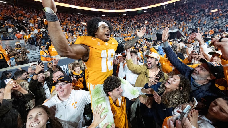 Tennessee running back DeSean Bishop (18) celebrates with fans after an NCAA college football...