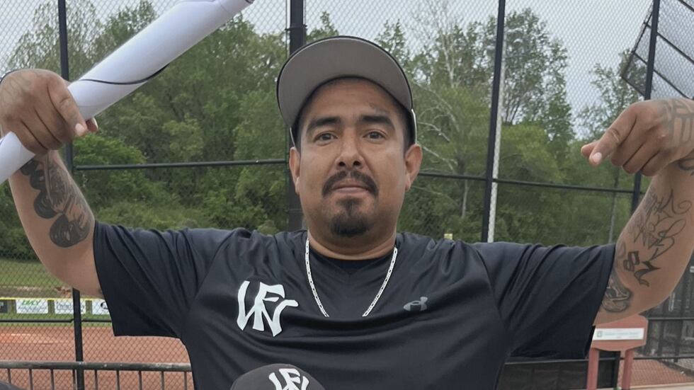 Jorge Fonseca celebrates with players on his travel baseball team. Fonseca was shot and killed...