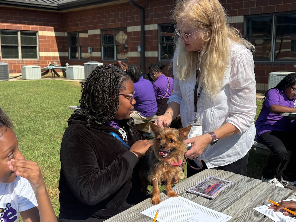 Bessemer students receive emotional support from therapy dogs.