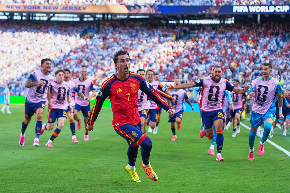 Spain's Ferran Torres (7) celebrates scoring their first goal during the World Cup final...