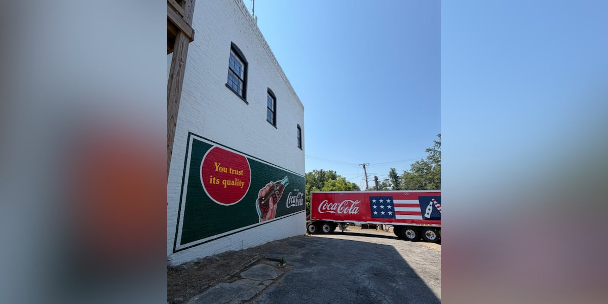 Centreville unveils restored 1940s Coca-Cola mural in town square