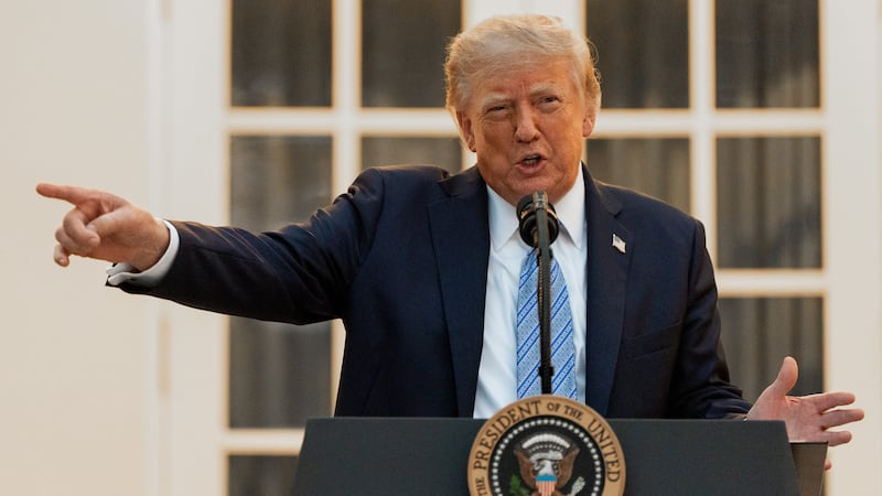 President Donald Trump speaks during a dinner in the Rose Garden of the White House, Thursday,...
