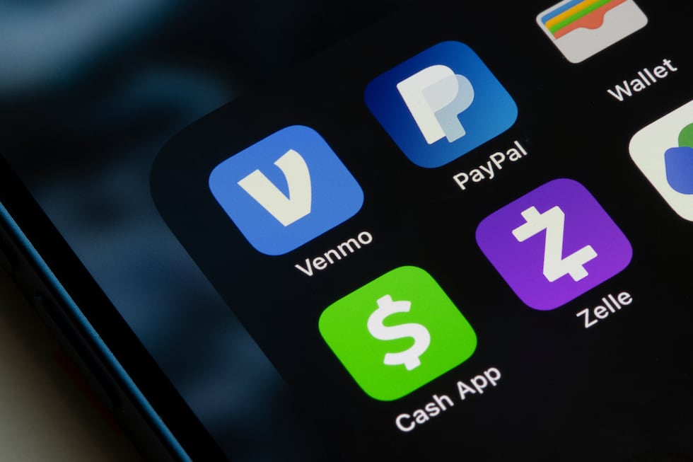 Portland, OR, USA - Dec 12, 2022: Venmo, PayPal, Cash App, and Zelle app icons are seen on an...