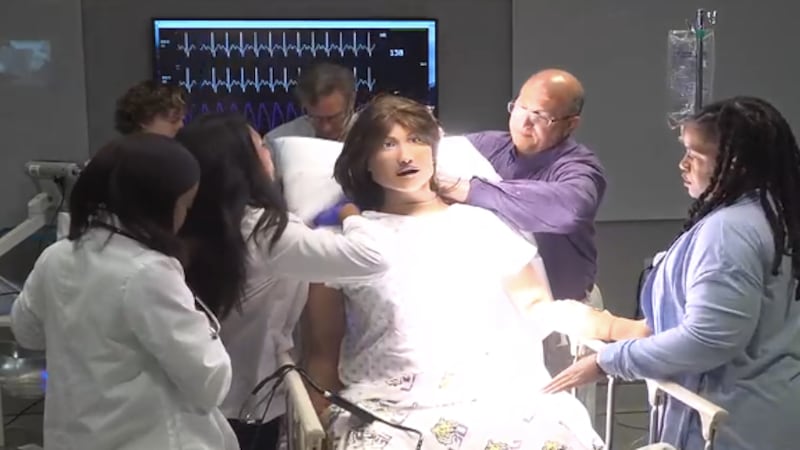 Students at LSU Health New Orleans train with a high-tech medical simulator built to look,...