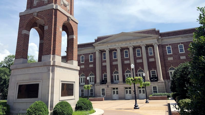 The Autherine Lucy Clock Tower at the Malone Hood Plaza stands in front of Foster Auditorium...