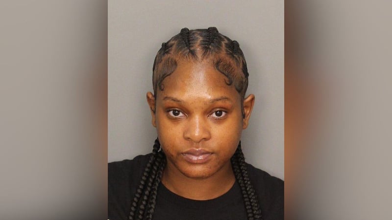 Ebony Nichole Jackson is charged with financial exploitation of the elderly and fraudulent use...