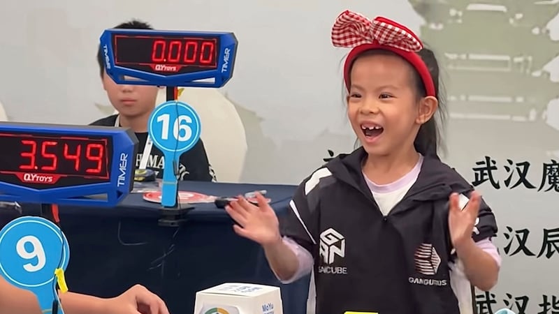 In this photo taken from video and released by YouTube@cuberootme, 6-year-old Lian Yunzhi...