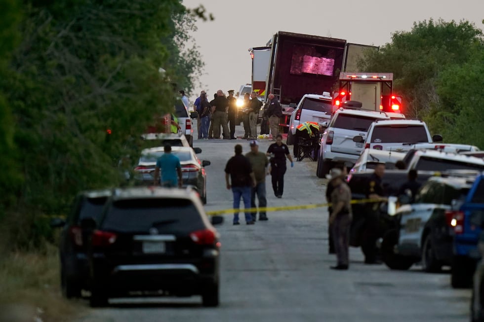 FILE - Police and other first responders work the scene where officials say dozens of people...