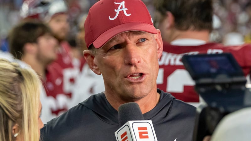 Alabama head coach Kalen DeBoer talks with ESPN after an NCAA college football game against...
