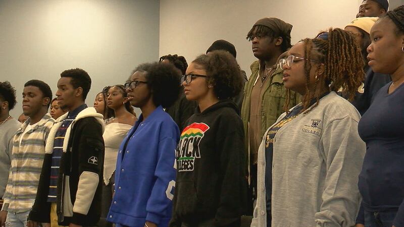 The Stillman College Choir is practicing before Sunday's Christmas performance at Birthright...