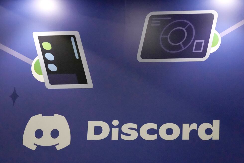 FILE - A display Discord stands at the company's booth at the Game Developers Conference 2023...