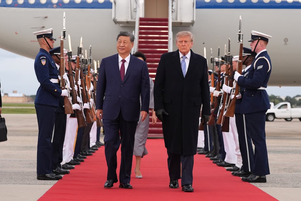 President Donald Trump and first lady Melania Trump walk with China's President Xi Jinping and...