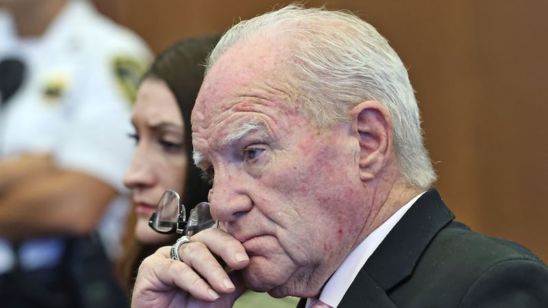 Defense attorney Kevin Reddington and defendant Lindsay Clancy listen to Judge William...