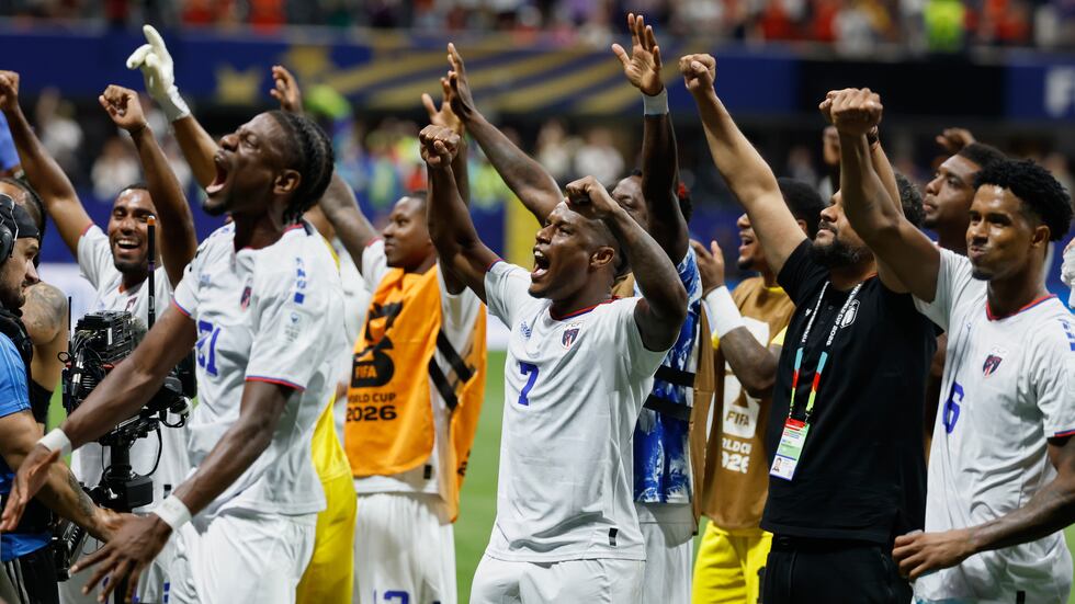 Cape Verde players celebrate after the World Cup Group H soccer match between Spain and Cape...