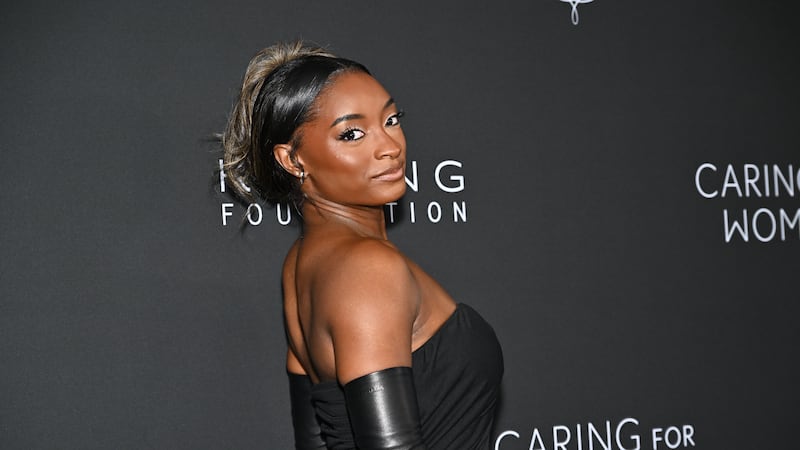 Simone Biles attends the Kering Foundation's fifth annual Caring for Women benefit dinner at...