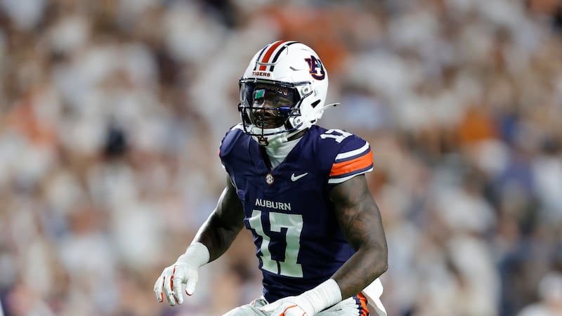 Auburn linebacker Xavier Atkins (17) defends during the first half of an NCAA football game...
