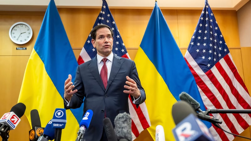 U.S. Secretary of State Marco Rubio talks to the press at the U.S. Mission to International...