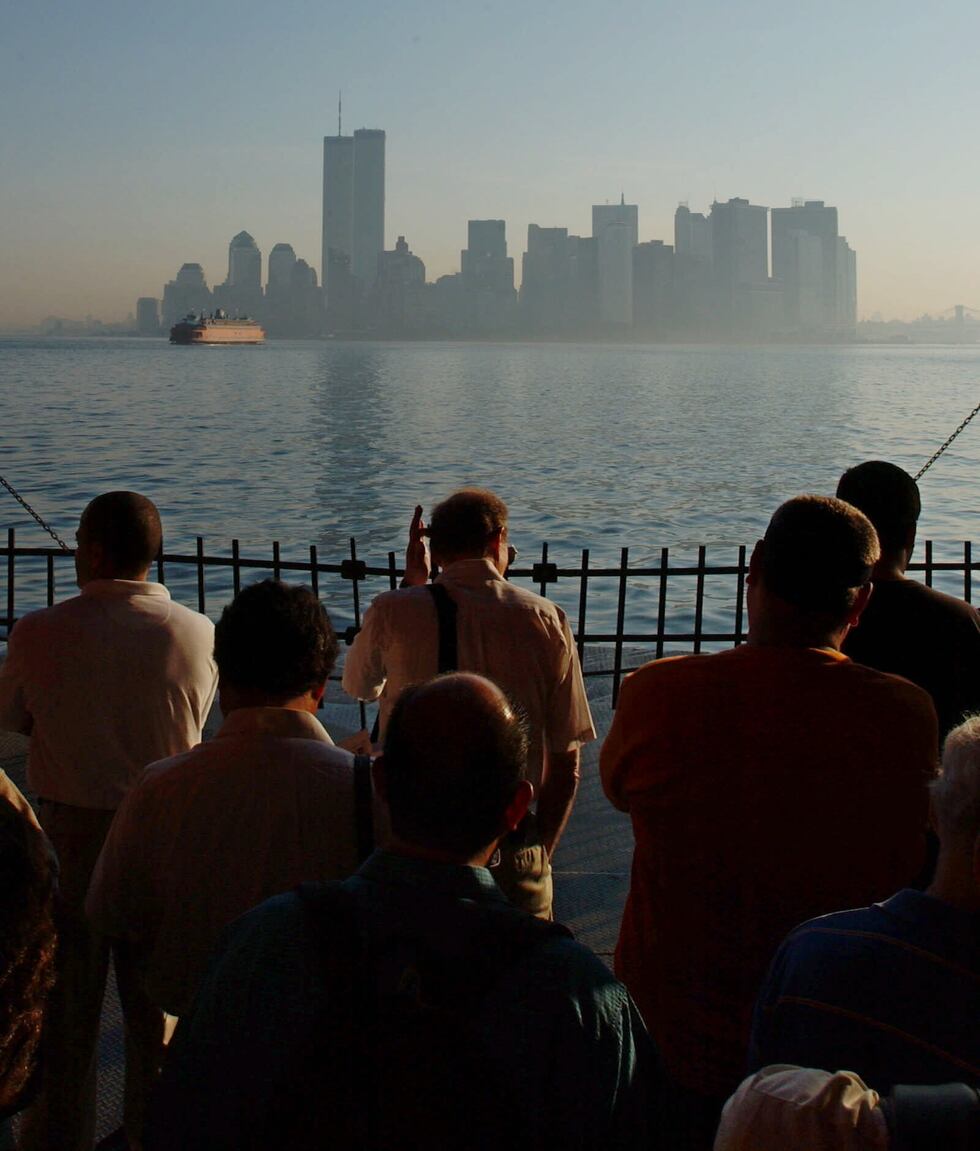 The Manhattan skyline rises out of the early morning haze Thursday, Aug. 9, 2001, as New York...