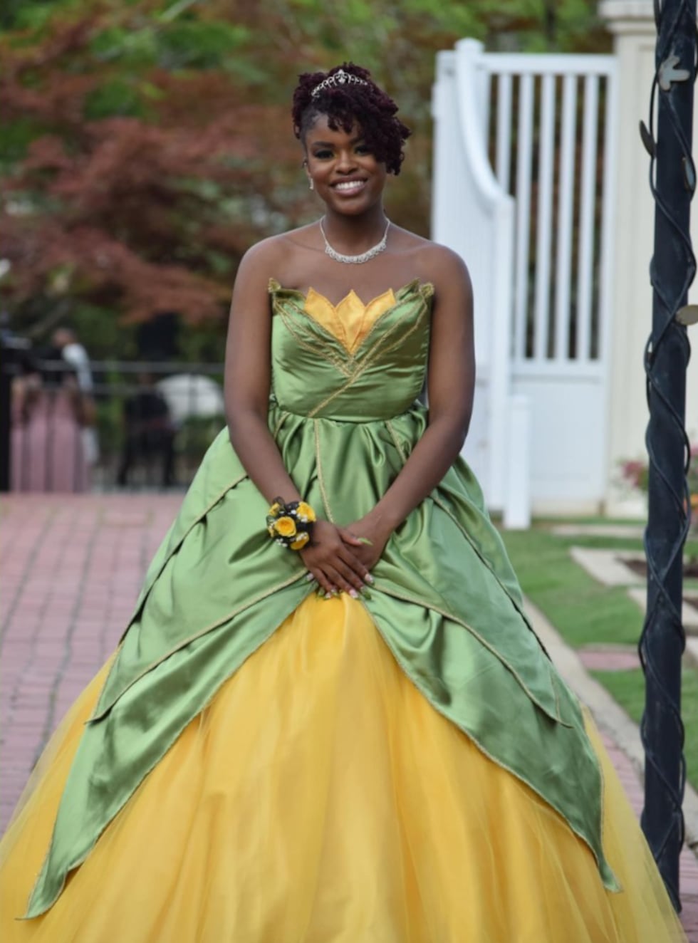 Shades Valley High School senior designs and sews prom dress inspired by Princess Tiana