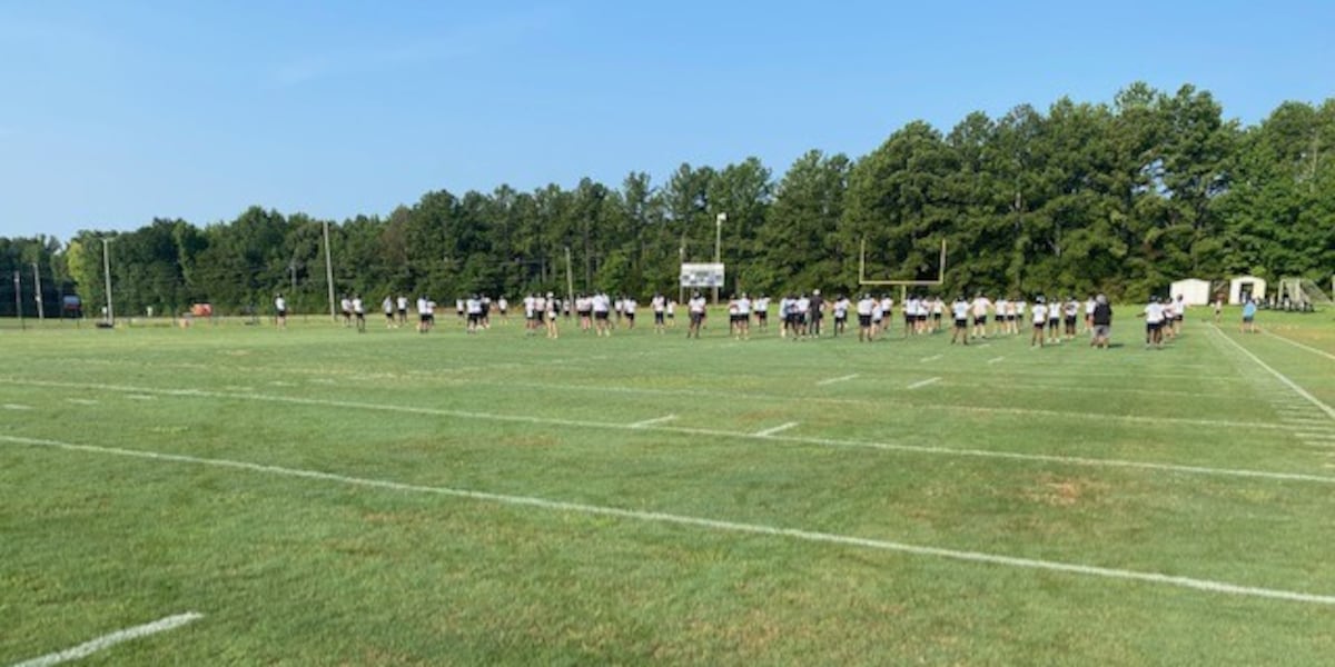 Northridge High School football team takes precautions during fall camp preparations in the heat