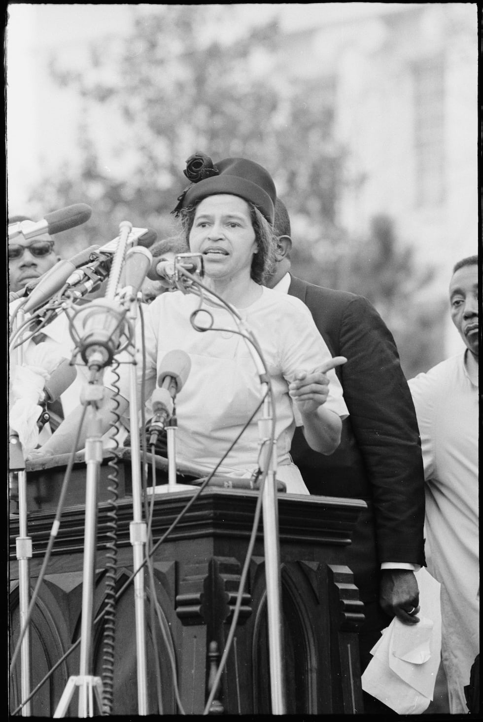 Rosa Parks delivers remarks in front of the Alabama State Capitol at the conclusion of the 54...