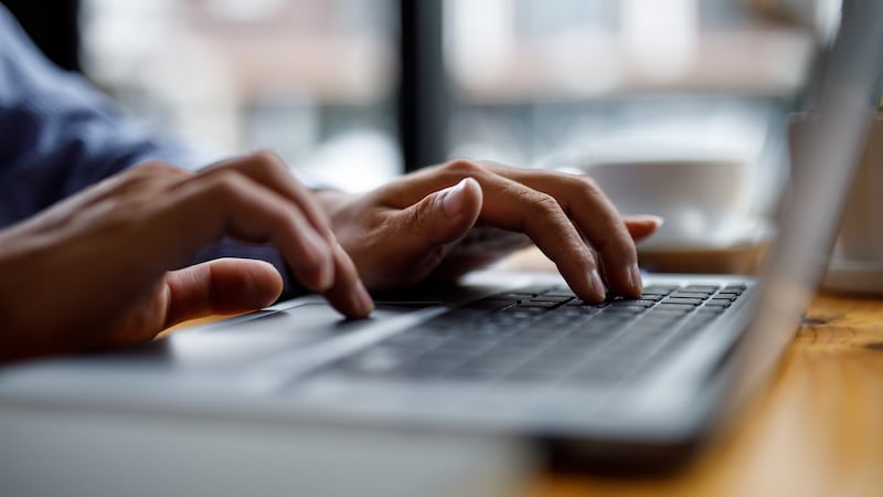 Close up of hands typing on computer keyboard panoramic banner, businessman or student using...