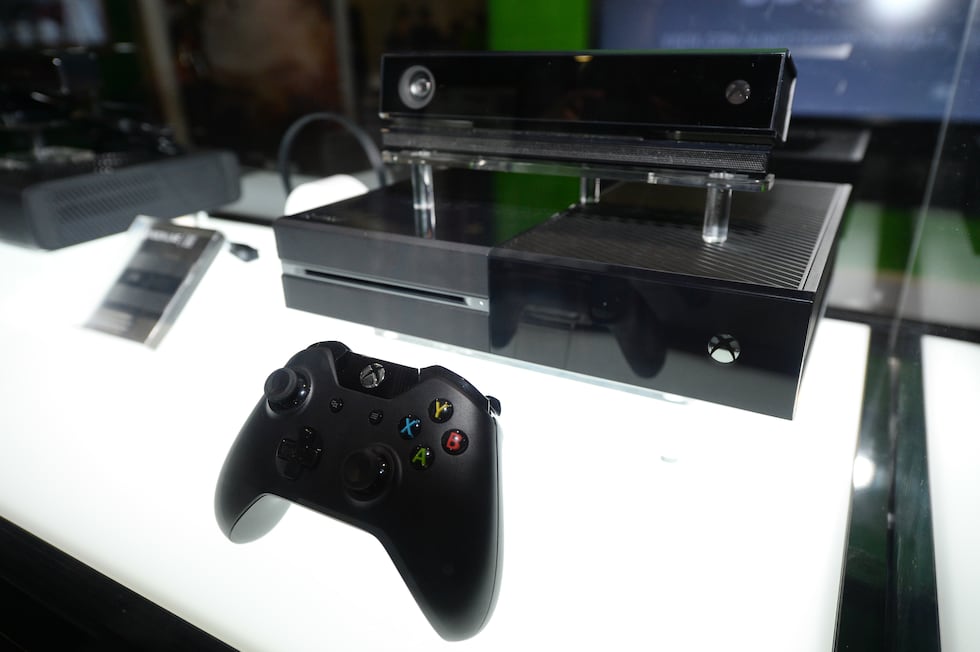 FILE - In this Aug. 28, 2013, file photo, the Microsoft Xbox One console is on display at the...