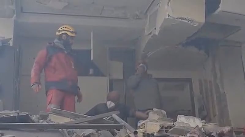 Rescuers in Tehran, Iran, raced to save people trapped in the bombed out remains of what...