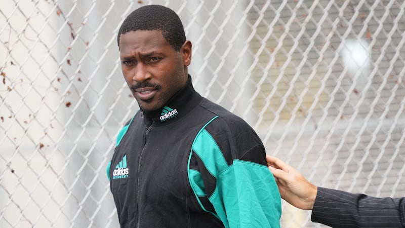 FILE - Former NFL star wide receiver Antonio Brown walks after being released from the Turner...