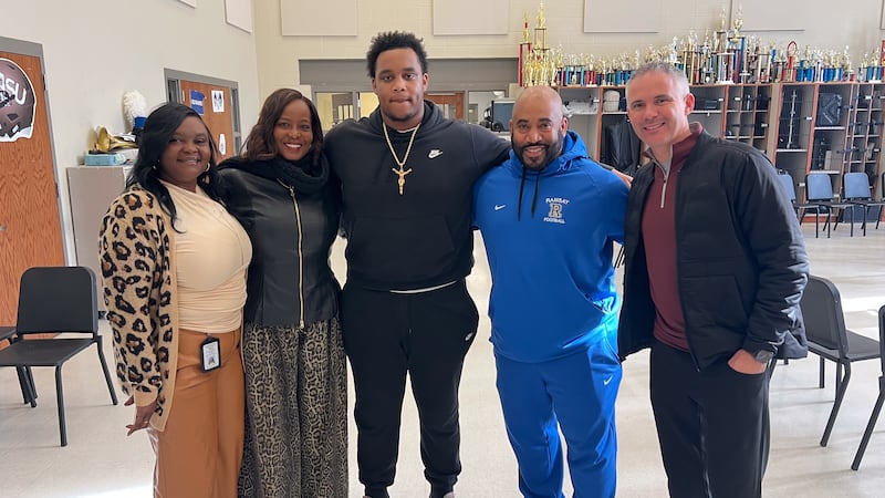 Ramsay defensive lineman Karlos May (center) was visited by Florida State head coach Mike...