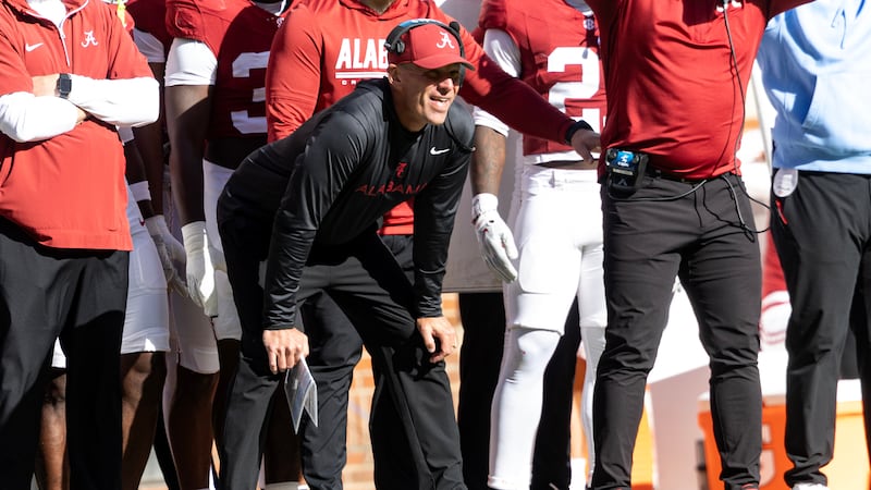 Alabama head coach Kalen DeBoer watches from the sideline during the first half an NCAA...
