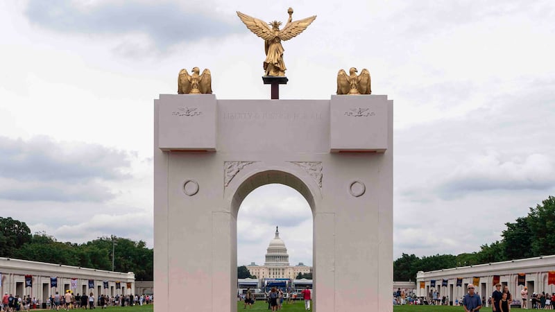 FILE - A mockup of President Donald Trump's proposed triumphal arch stands at the Great...