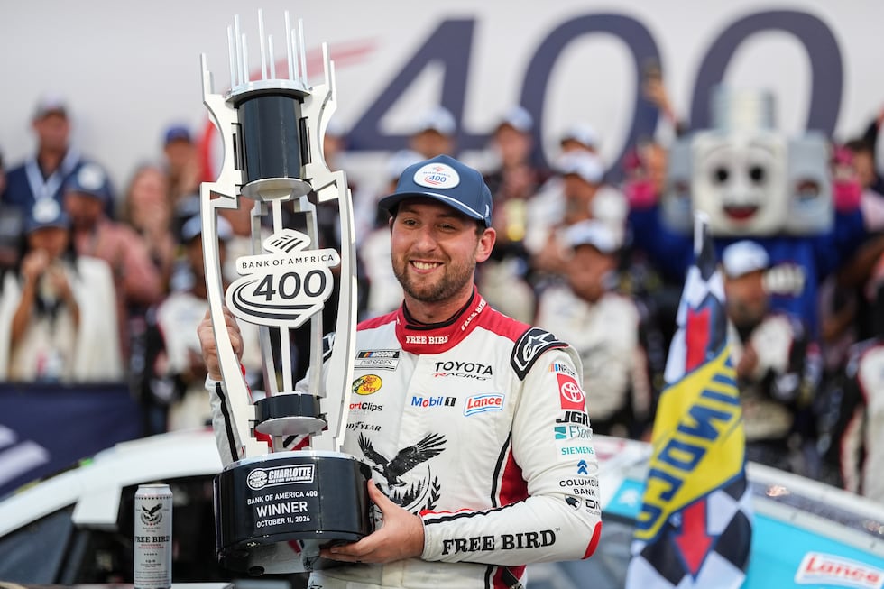 Chase Briscoe celebrates in Victory Lane after winning a NASCAR Cup Series auto race, Sunday,...
