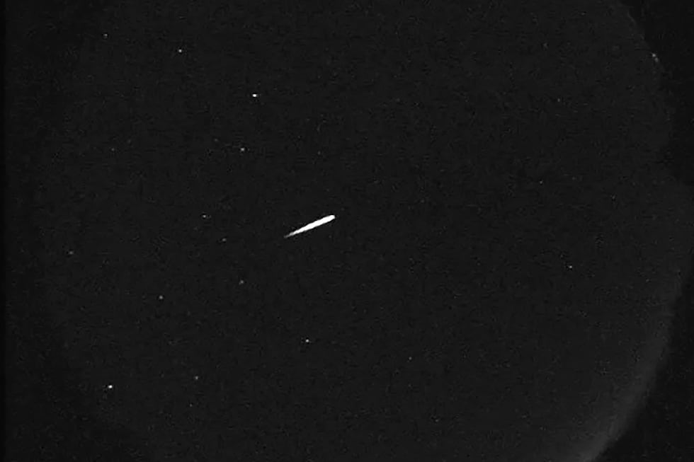 FILE - This photo provided by NASA shows a meteor from the Orionid shower on Oct. 13, 2015....