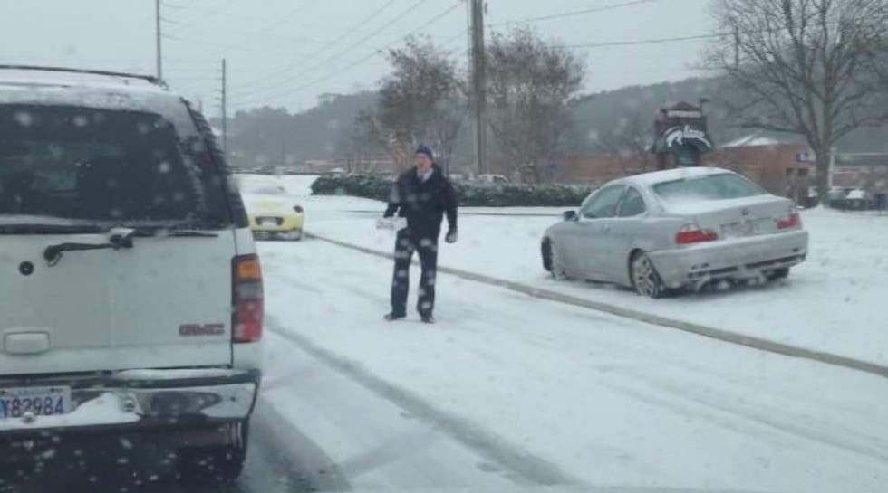 Meadows handing out boxed meals to drivers. Source: Lauren Dango