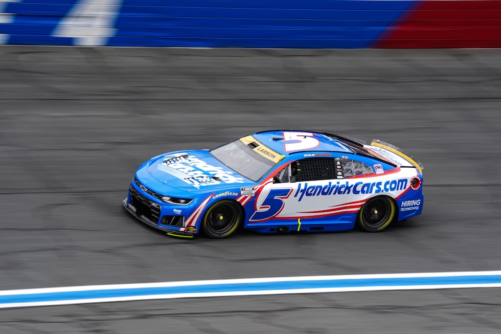 Kyle Larson steers through Turn 4 during a NASCAR Cup Series auto race, Sunday, Oct. 11, 2026,...