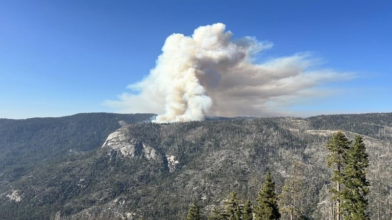 This photo provided by the National Parks Service shows the Dome Fire burning in Yosemite...